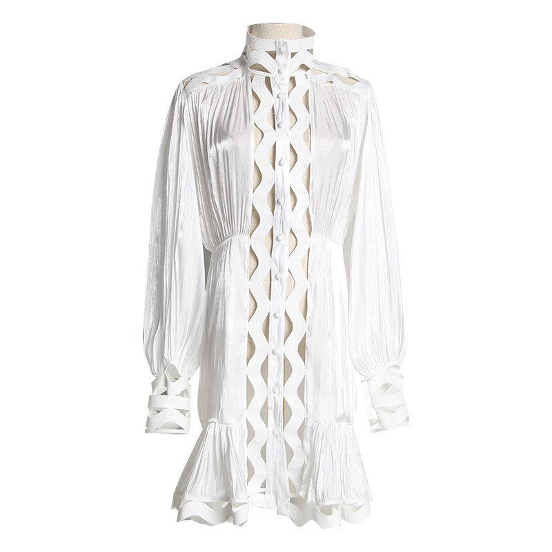 Korean version of the temperament solid color hollow wavy striped stand collar long-sleeved shirt fishtail dress