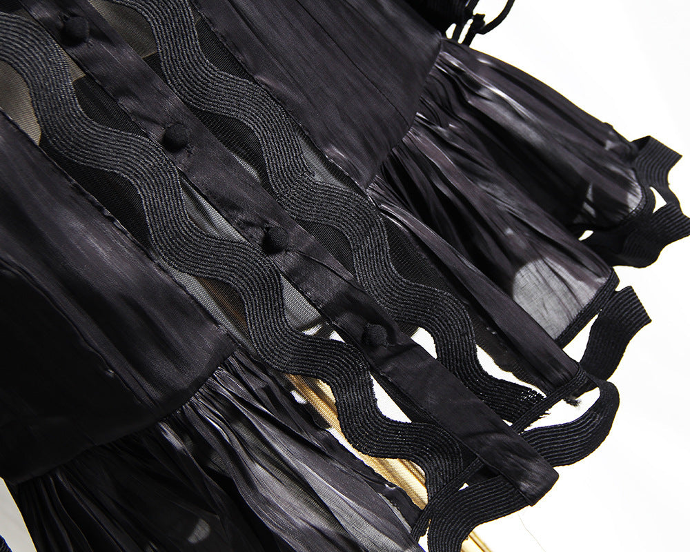 Korean version of the temperament solid color hollow wavy striped stand collar long-sleeved shirt fishtail dress