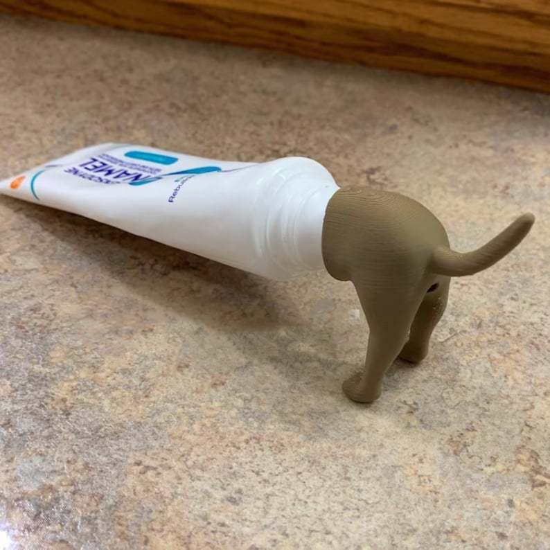 Household Fashion Simple Dog Butt Shape Toothpaste Topper