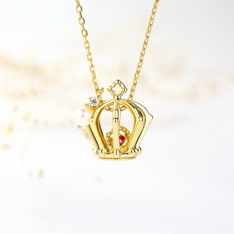 Gold crown pendant
